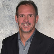 Professional headshot of Dave Schick