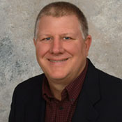 Professional headshot of David Phillip
