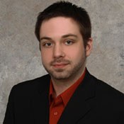 Professional headshot of TJ Turner